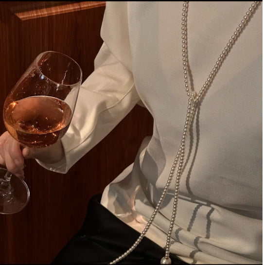 Extra long pearl necklace