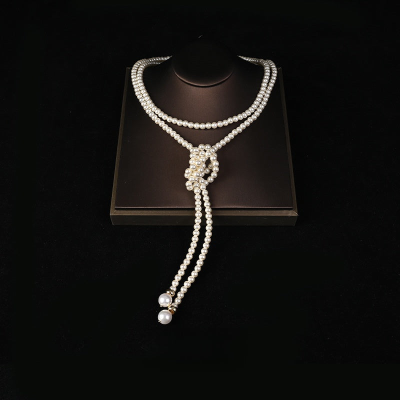 Extra long pearl necklace