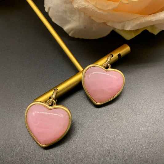 Heart-shaped pink earrings