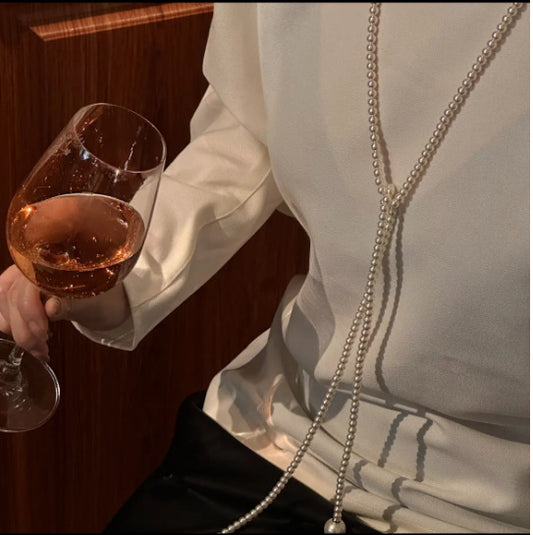 Extra long pearl necklace