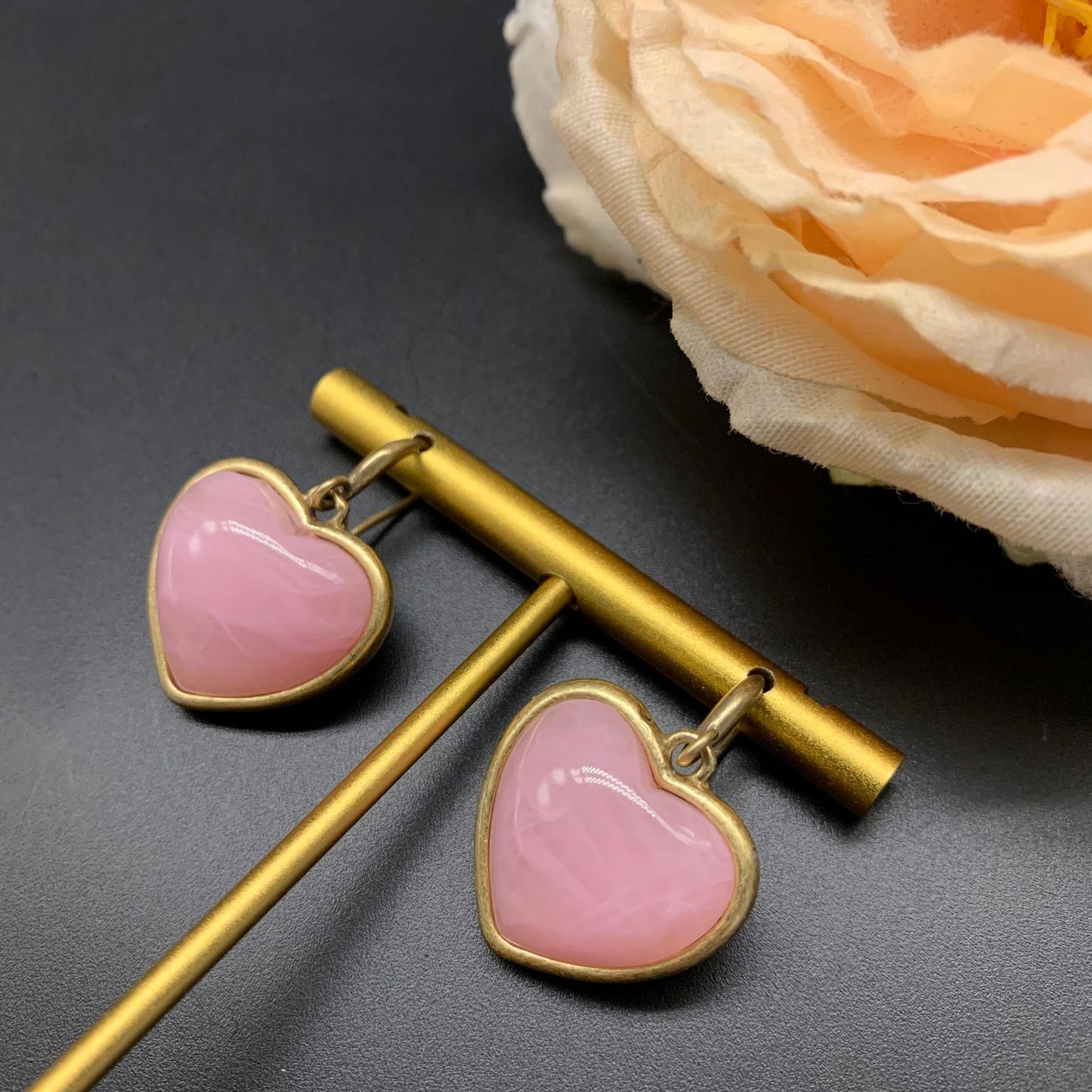 Heart-shaped pink earrings